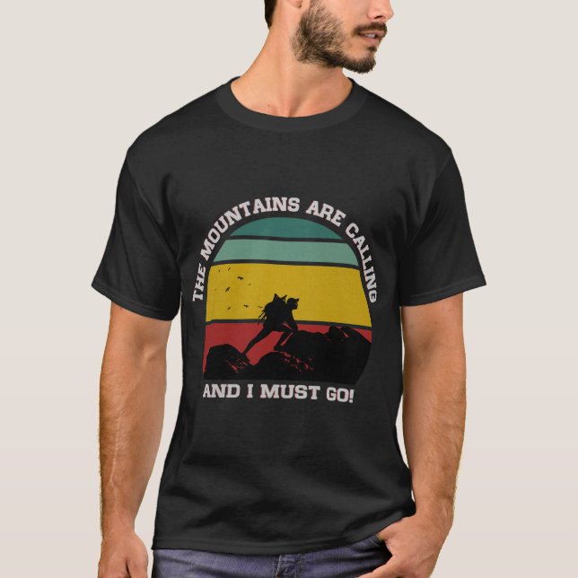THE MOUNTAINS ARE CALLING AND I MUST GO HIKING  T-Shirt (Front)