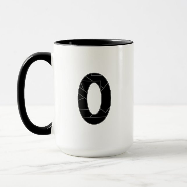 The number zero (0) in black mug (Left)