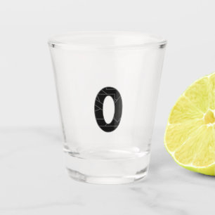 The number zero (0) in black shot glass