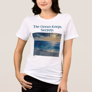 The Ocean Keeps Secrets – A Compelling Seascape Tri-Blend Shirt