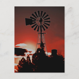 The old windmill at sunset postcard