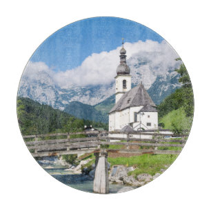 The parish church of Ramsau in Bavaria, Germany Cutting Board