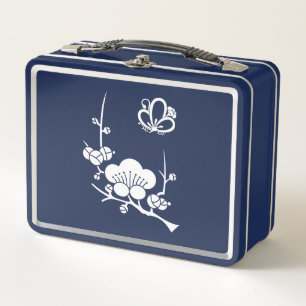 The plum-tree is in the middle of the shade metal lunch box