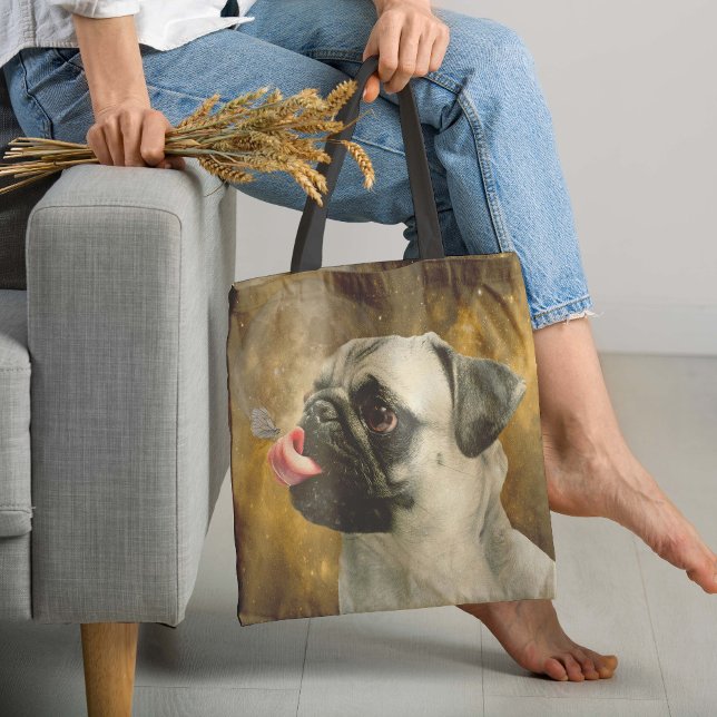 The Pug, The Butterfly and The Universe Tote Bag (Here we present a very creative tote bag featuring an adorable pug dog contemplating a vast universe)