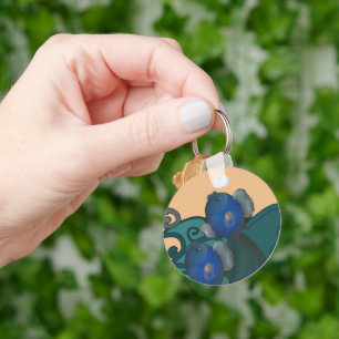 The rising fishes key ring