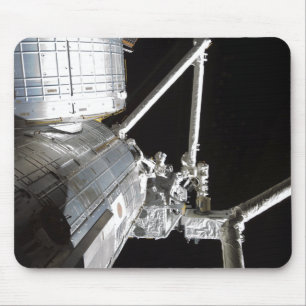 The robotic arm of the Japanese Experiment Modu 2 Mouse Mat