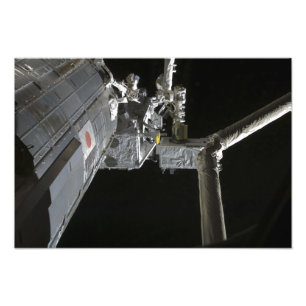 The robotic arm of the Japanese Experiment Modu Photo Print