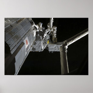 The robotic arm of the Japanese Experiment Modu Poster