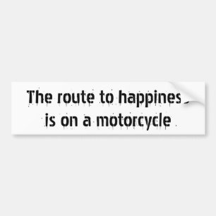 The route to happinessis on a motorcycle bumper sticker