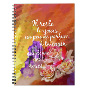 The scent of the roses still remains in the hand. notebook