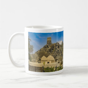 The serene beauty of Al Bidya Mosque in the UAE Coffee Mug