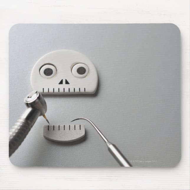 The skeleton which dental treatment is taken mouse mat (Front)