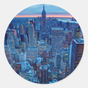 The skyscrapers of Manhattan are lit Classic Round Sticker