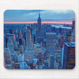 The skyscrapers of Manhattan are lit Mouse Mat