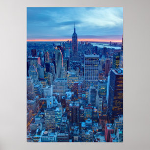 The skyscrapers of Manhattan are lit Poster