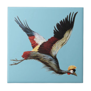 The South African crowned crane in mid-flight Tile