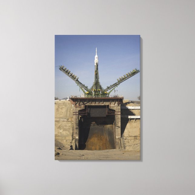 The Soyuz rocket is erected into position 2 Canvas Print (Front)