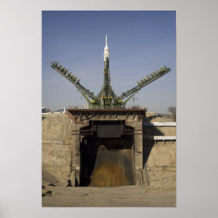 The Soyuz rocket is erected into position 2 Poster