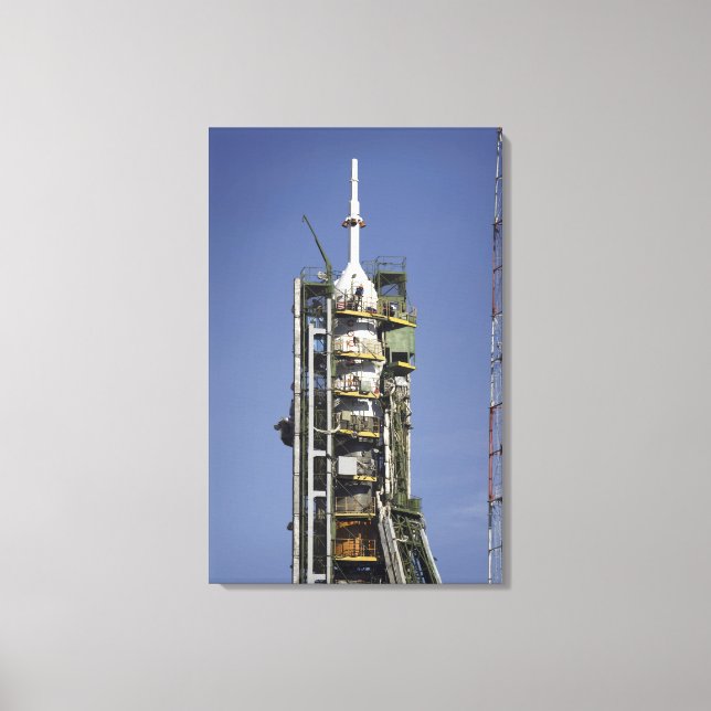 The Soyuz rocket is erected into position 3 Canvas Print (Front)