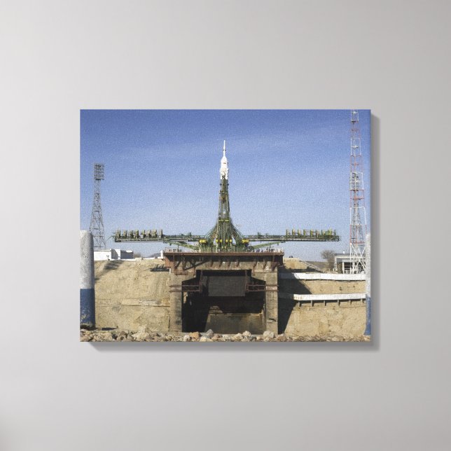 The Soyuz rocket is erected into position 6 Canvas Print (Front)