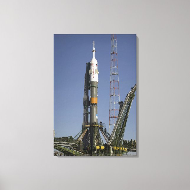 The Soyuz rocket is erected into position Canvas Print (Front)