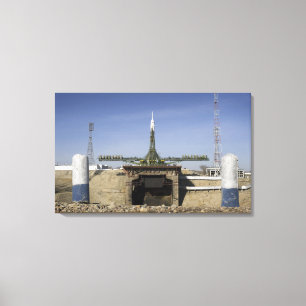 The Soyuz rocket is erected into position Canvas Print