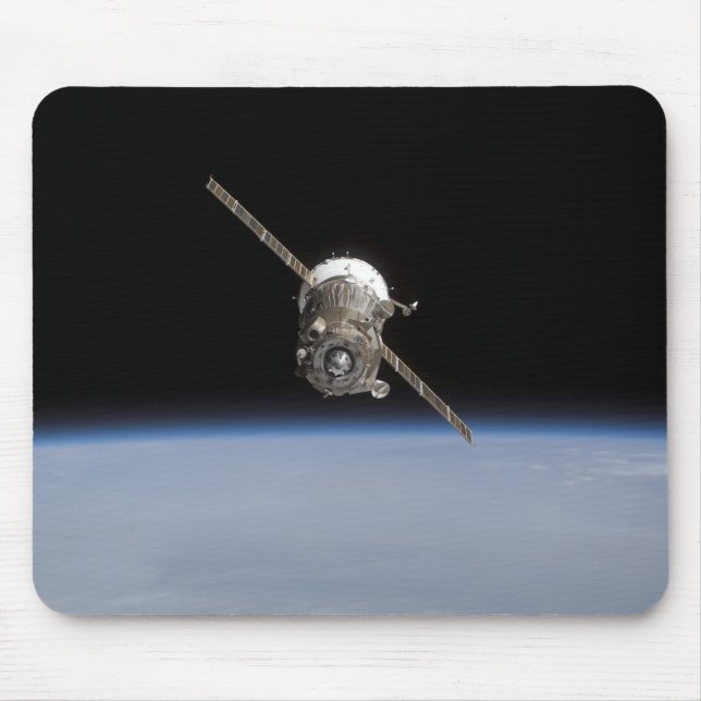 The Soyuz TMA-11 spacecraft above Earth's horiz Mouse Mat (Front)