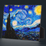 The Starry Night by Vincent Van Gogh Plaque<br><div class="desc">Vincent Van Gogh The Starry Night. This is an old masterpiece from the dutch master painter Vincent Van Gogh.This fine art landscape painting has beautiful,  vibrant,  saturated color. Vincent Van Gogh was a dutch post impressionist painter. This image is in the public domain</div>
