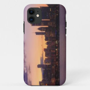 The sun sets over the Chicago skyline iPhone 11 Case