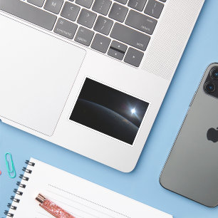 The Sun Setting Over Earth's Horizon.