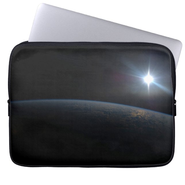 The Sun Setting Over Earth's Horizon. Laptop Sleeve (Front)