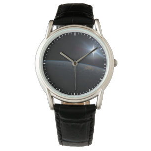 The Sun Setting Over Earth's Horizon. Watch