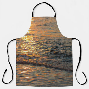 The sunset reflection on the beautiful ocean water apron