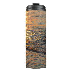 The sunset reflection on the beautiful ocean water thermal tumbler