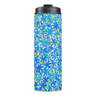 The surface is covered with many small blue flower thermal tumbler