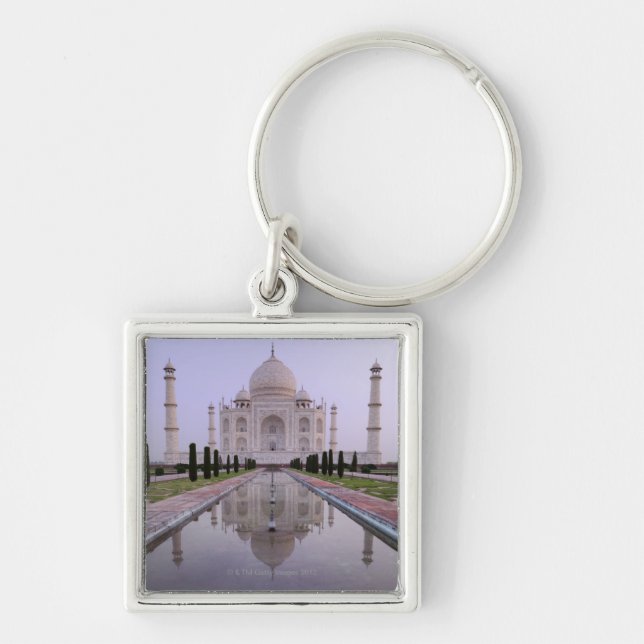 the Taj Mahal perfectly reflected in the pool in Key Ring (Front)