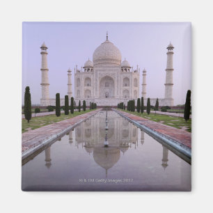 the Taj Mahal perfectly reflected in the pool in Magnet