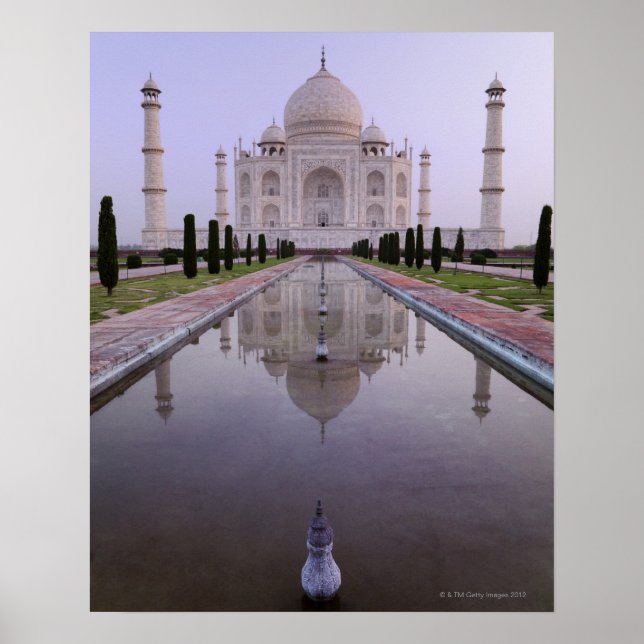 the Taj Mahal perfectly reflected in the pool in Poster (Front)