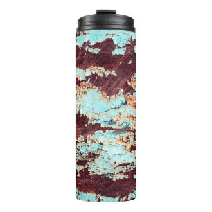 The texture of a rusty iron and a blue strongly pe thermal tumbler