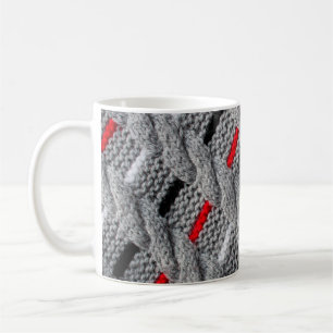 the texture of the knitted fabric with a striped p coffee mug