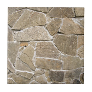 The texture of the walls of rough stones tile