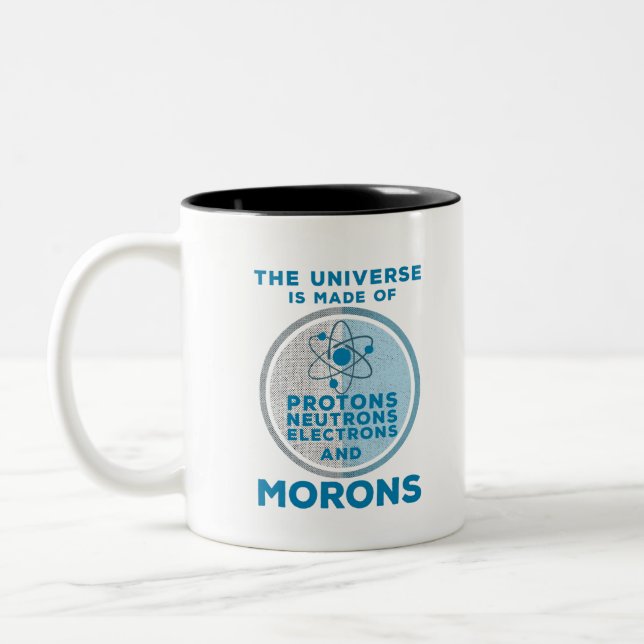 The Universe is made of morons Two-Tone Coffee Mug (Left)