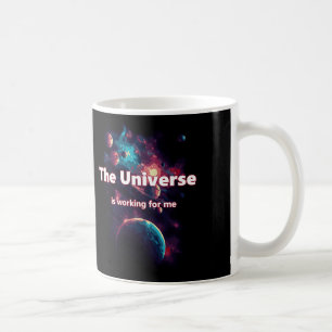 The universe is working for me.  coffee mug