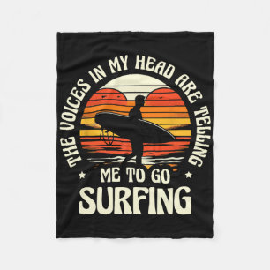 The Voices In My Head Are Telling Me To Go Surfing Fleece Blanket