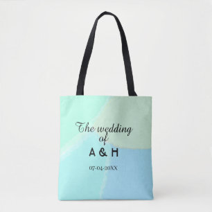 The wedding of add couple name initial letter date tote bag