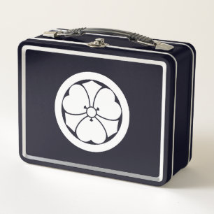 The whole sword is pickled in a bamboo shoot metal lunch box