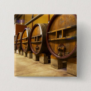 The wine cellar winery with big old wooden casks 15 cm square badge