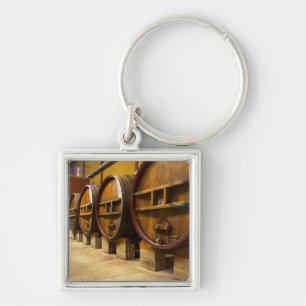 The wine cellar winery with big old wooden casks key ring