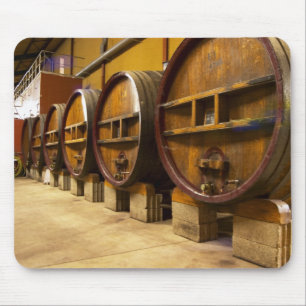 The wine cellar winery with big old wooden casks mouse mat