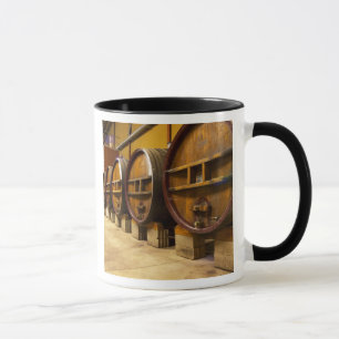 The wine cellar winery with big old wooden casks mug